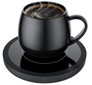 Image of a mug full of coffee. The mug is sitting on a round black electronic panel. The panel heats up to keep the coffee warm. 