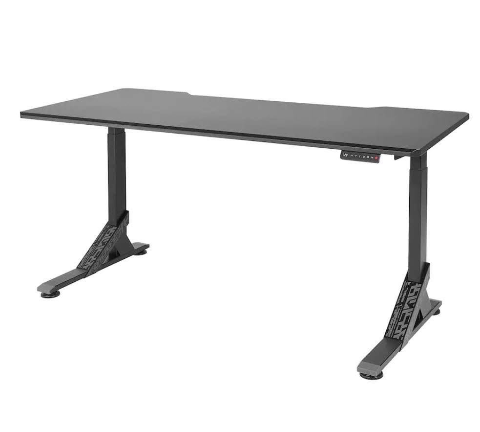 Photo of a standing desk from IKEA. The desk has two sturdy legs and a control panel with buttons to lower and raise the desk. 